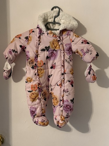 Baby pink floral snowsuit from
